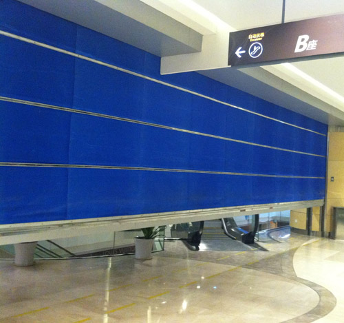 喜迎信阳出安智能卷帘门进驻信合龙江春天